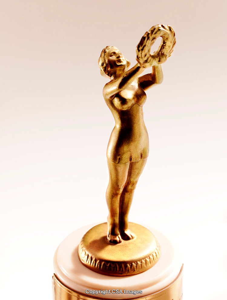 Golden Trophy of Woman Holding a Laurel Wreath in Celebration