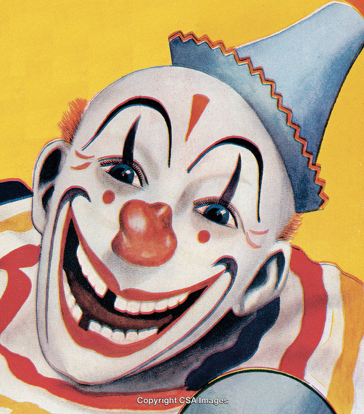 Close-Up of a Cheerful Clown in Colorful Face Makeup and Costume