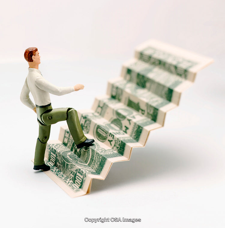 Miniature Figure Climbing Dollar Staircase Symbolizing Financial Growth and Success