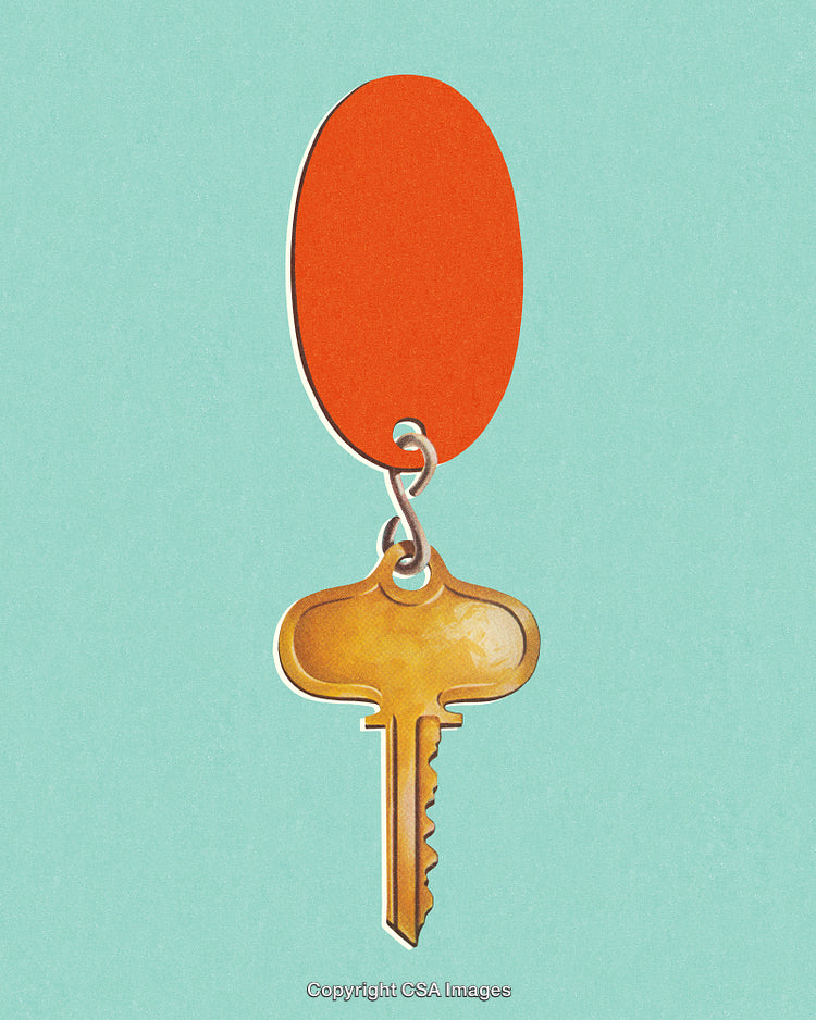 Golden Key and Orange Keychain on a Light Blue Background