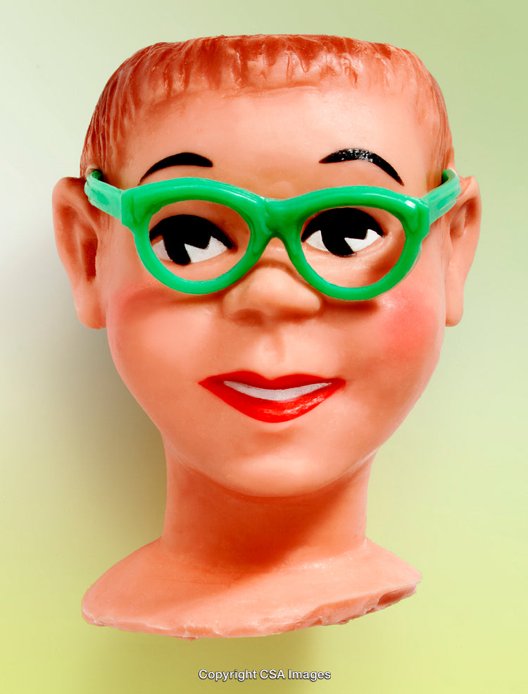 Close-Up of Vintage Plastic Toy Head with Green Glasses