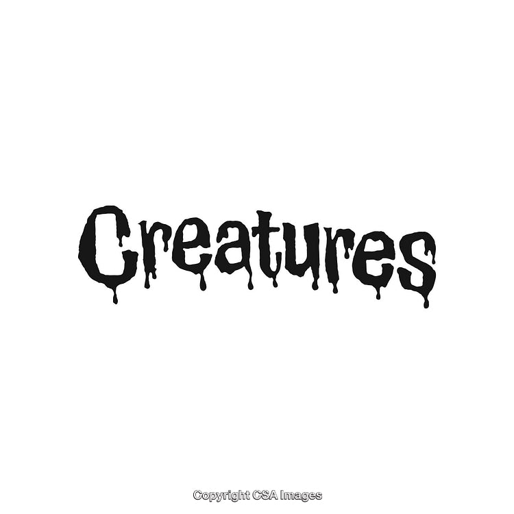 Eerie Dripping Font Text Spelling 'Creatures' with Mysterious Atmosphere