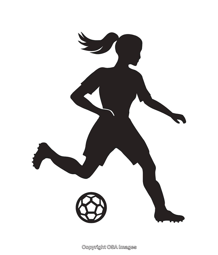 Silhouette of a Female Soccer Player in Action with Ball