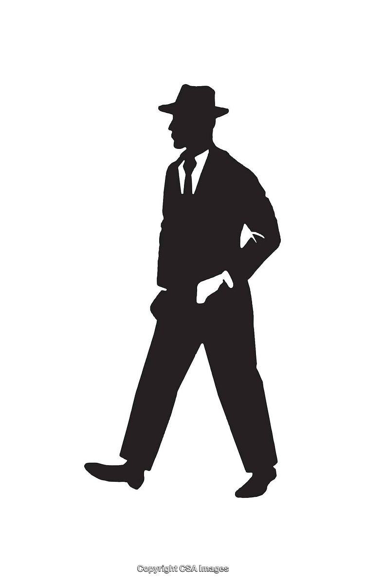 Silhouette of a Stylish Man Walking in Formal Attire