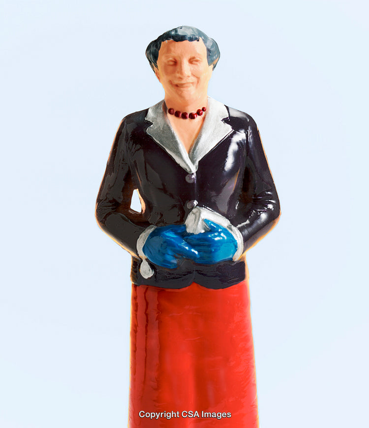 Colorful Figurine of a Woman in a Stylish Outfit