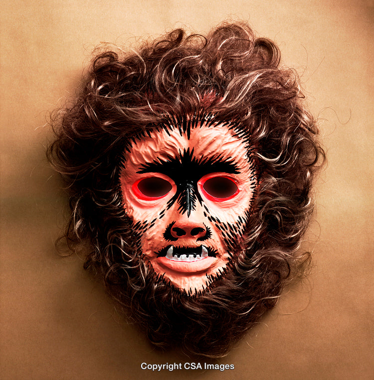 Colorful Mask Evoking Wild Beast Appearance on Neutral Background