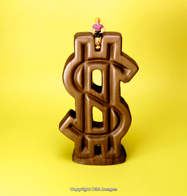 Miniature Woman Standing on Giant Dollar Sign Against Yellow Background