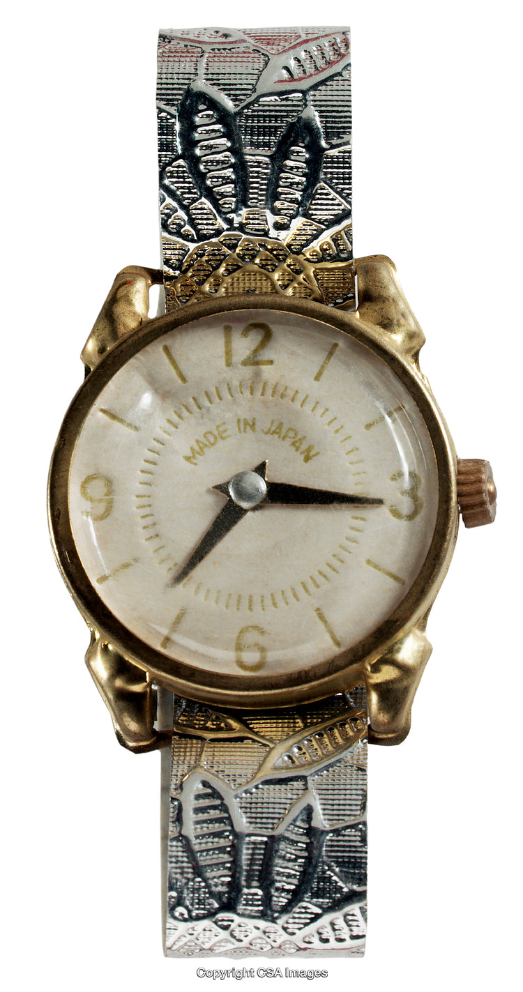 Vintage Watch with Decorative Metal Band and Unique Design