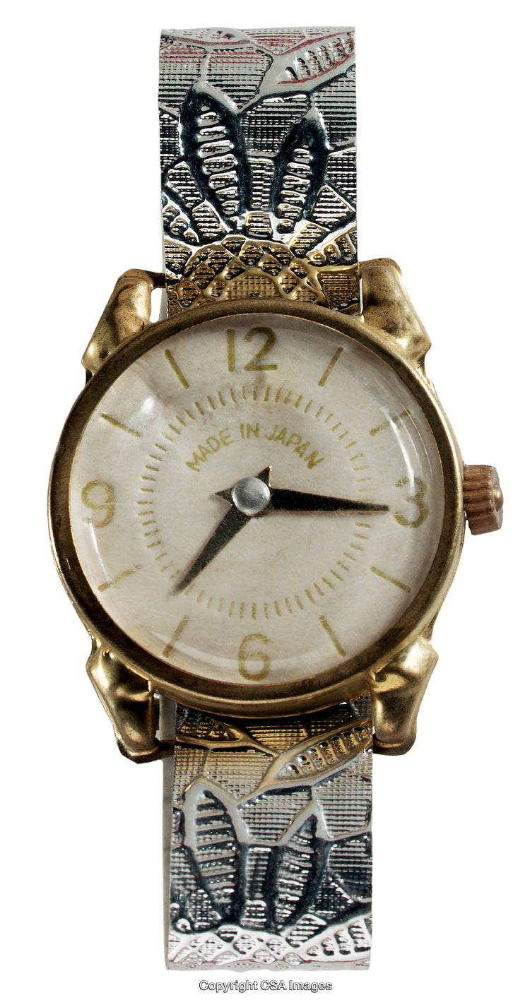 Vintage Watch with Decorative Metal Band and Unique Design