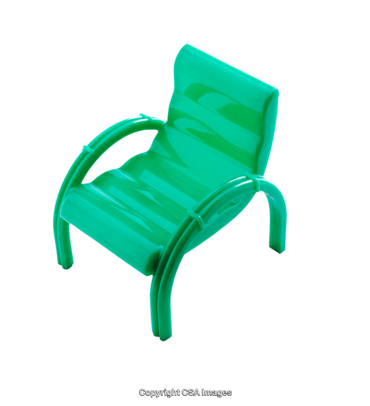 Green Plastic Toy Chair in a Minimalistic Isolated White Background