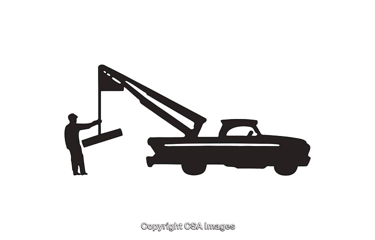 Silhouette Illustration of a Tow Truck with Worker in Operation