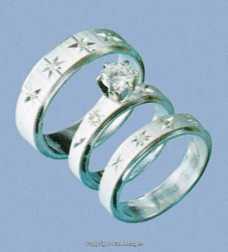 Elegant Silver Wedding Bands Featuring Star Engravings and Sparkling Design