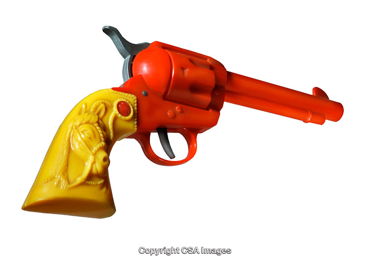 Brightly Colored Toy Revolver with Decorative Handle Close-Up