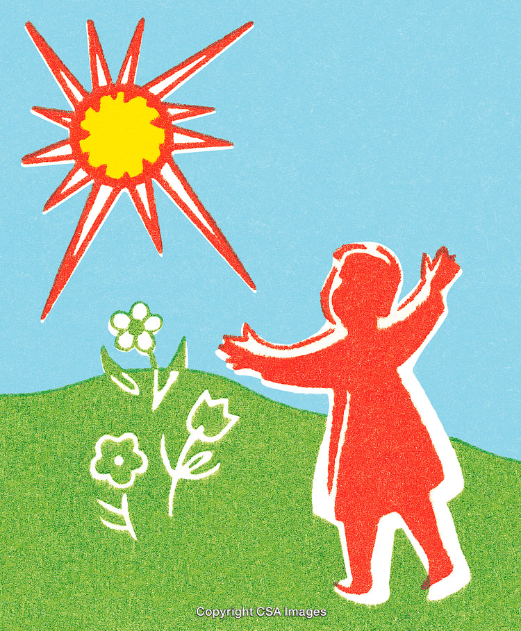 Child Enjoying Nature Outdoors with Flowers and Sunshine