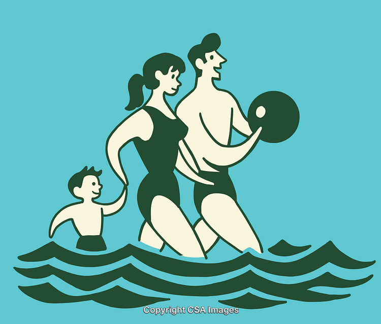 Family Enjoying Leisure Time Swimming in the Sea Together
