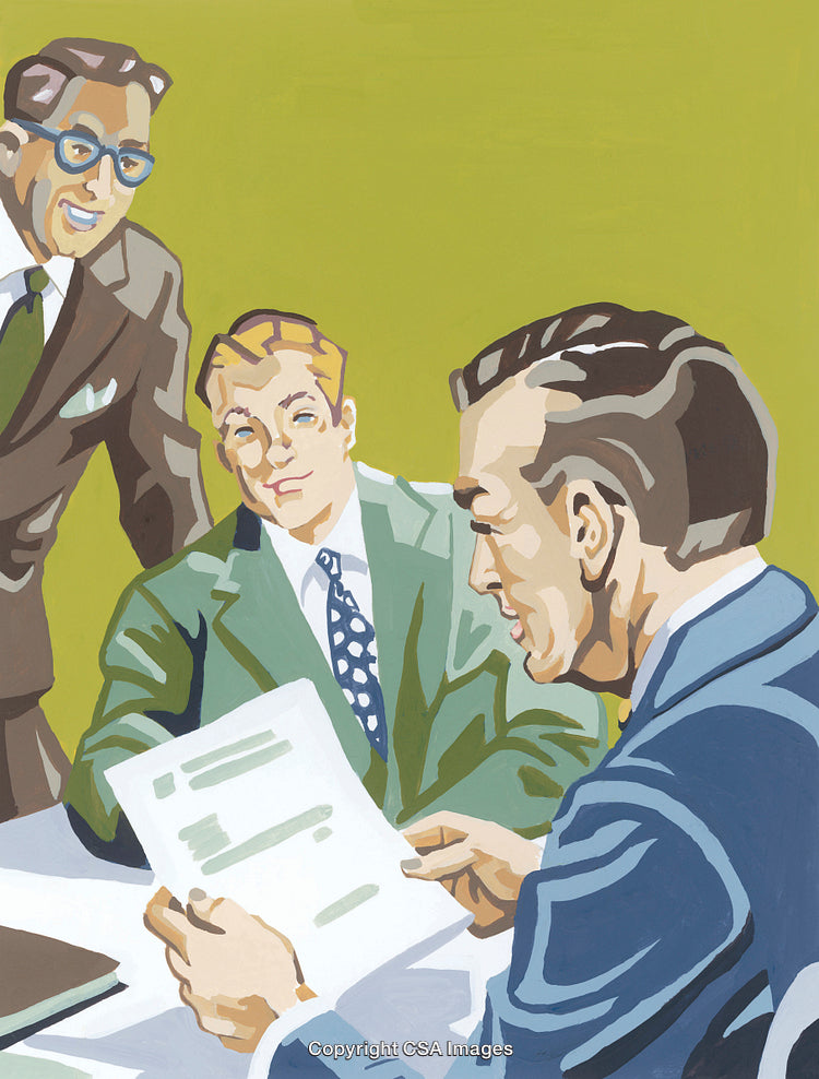 Three Colleagues Reviewing Documents During a Professional Meeting