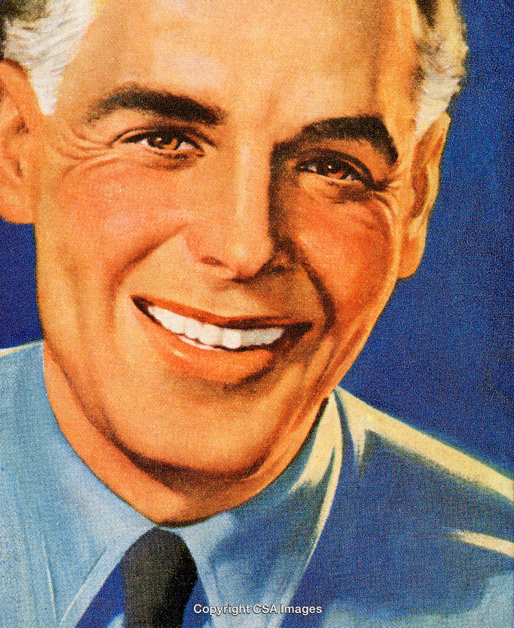 Smiling Man in Retro Attire with a Blue Shirt on Blue Background