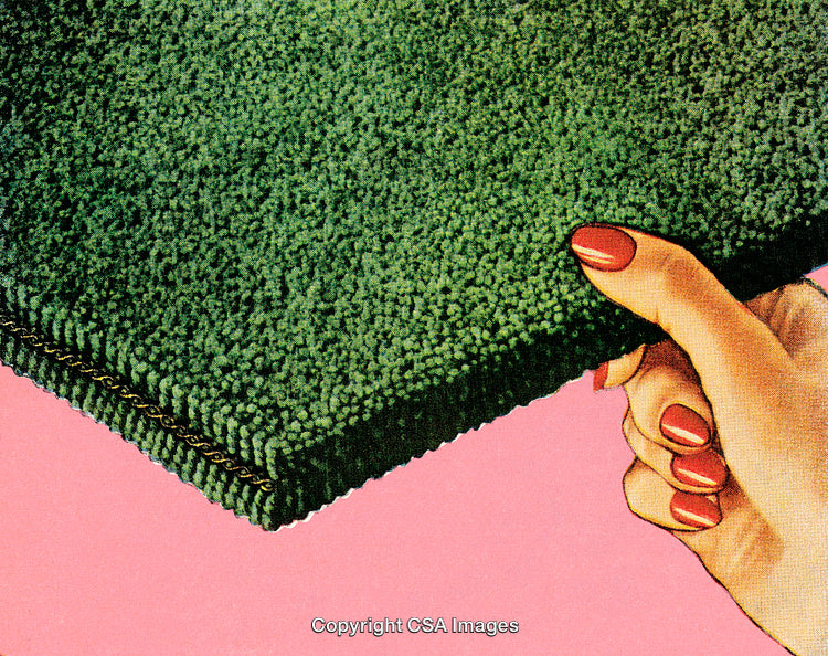 Vintage Styled Image of a Hand Holding Green Textured Fabric Sample