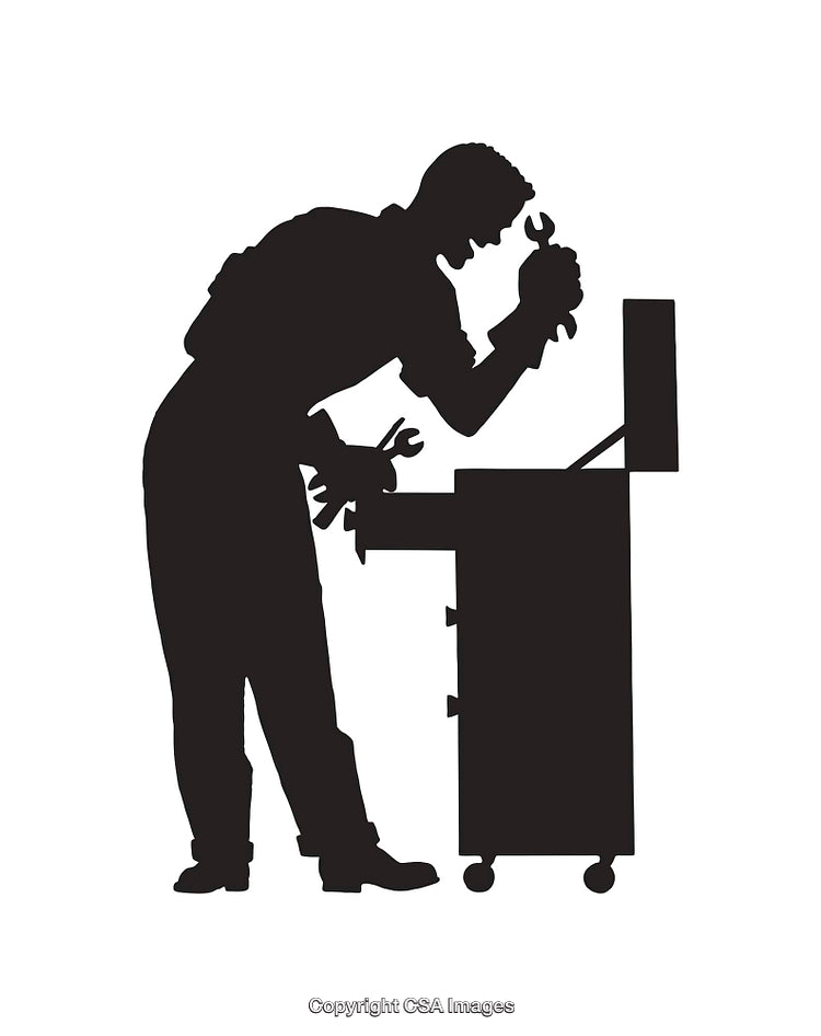 Silhouette of Mechanic Working with Tools at Workbench