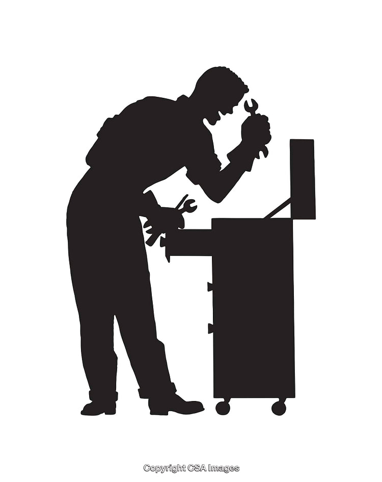 Silhouette of Mechanic Working with Tools at Workbench
