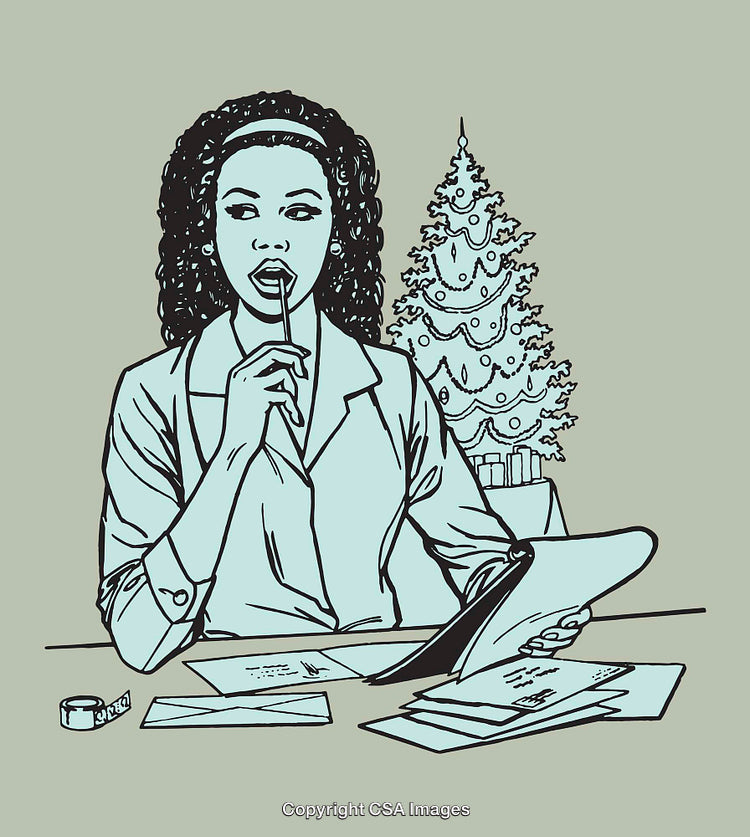 Thoughtful Woman Writing Holiday Cards in Front of a Christmas Tree
