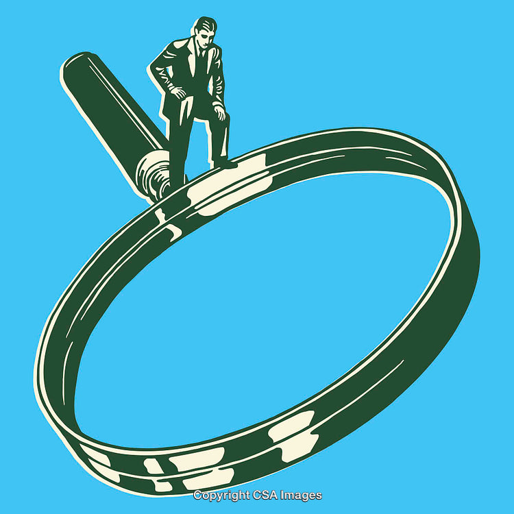 Businessman Standing On Magnifying Glass Against Bright Blue Background