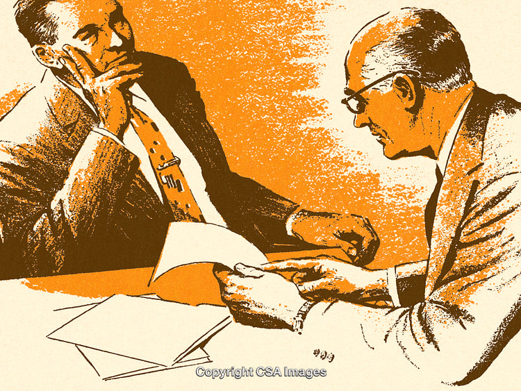 Two Businessmen Engaged in a Serious Professional Discussion and Paperwork Review