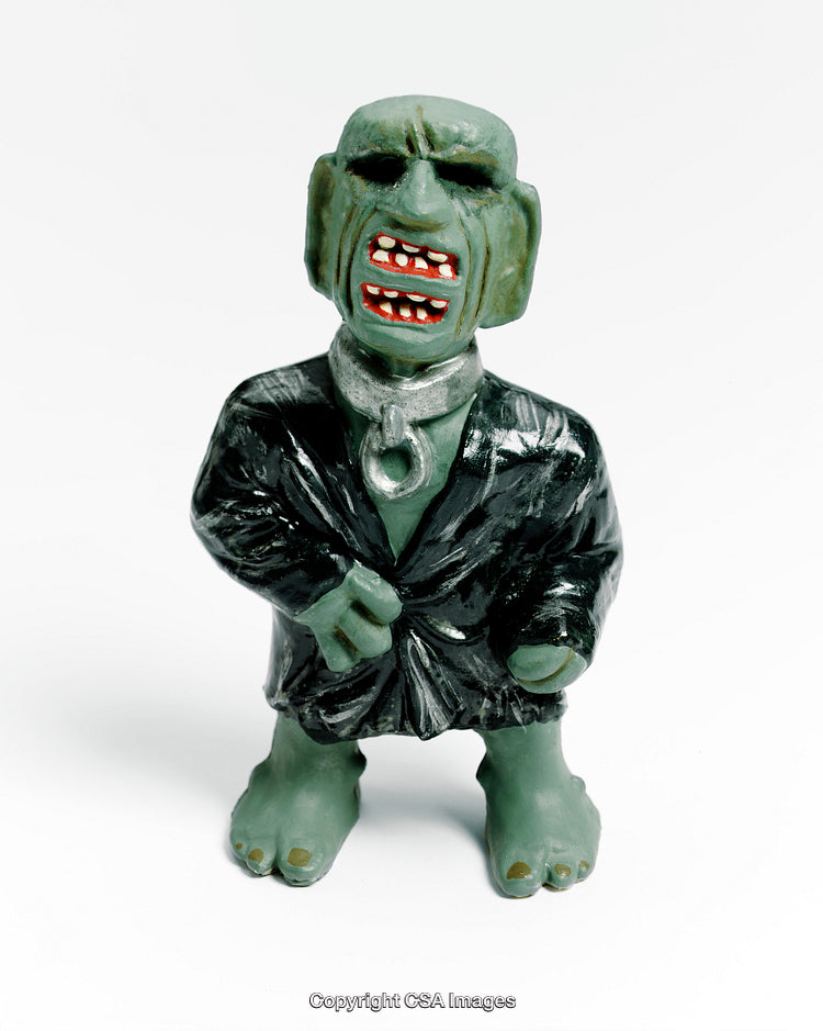 Green Figurine with Expressive Features and Unique Design in Vibrant Colors