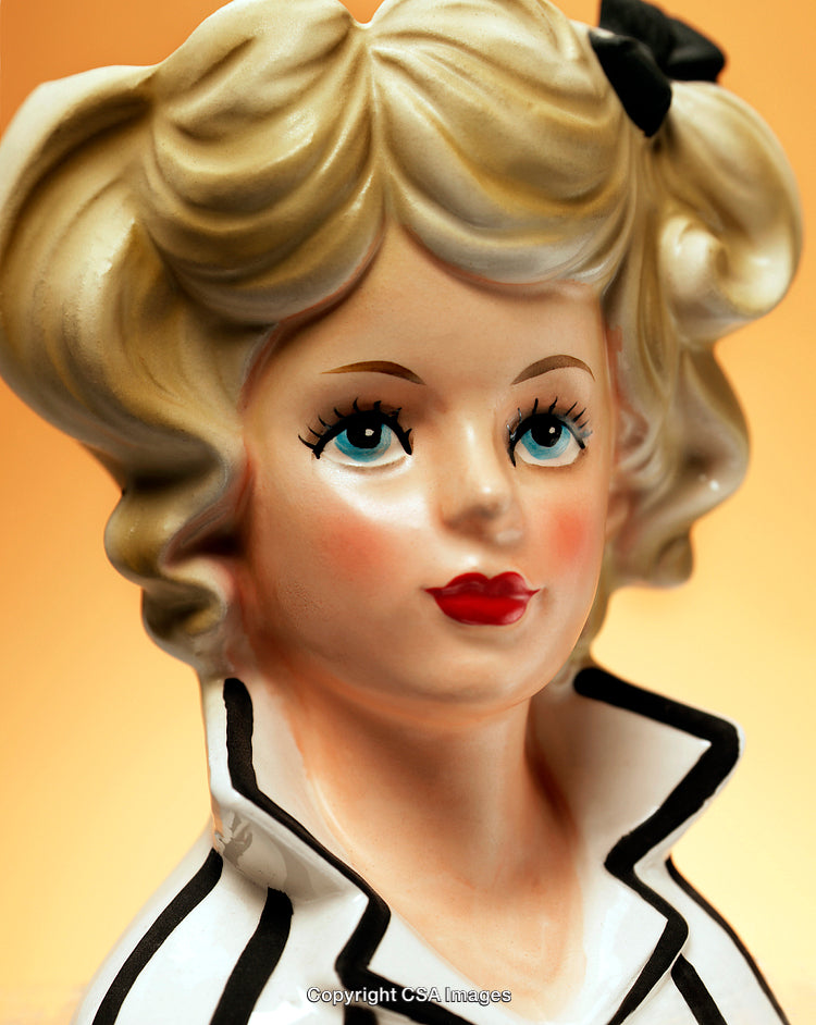 Decorative Porcelain Figurine of a Woman in Vintage Style