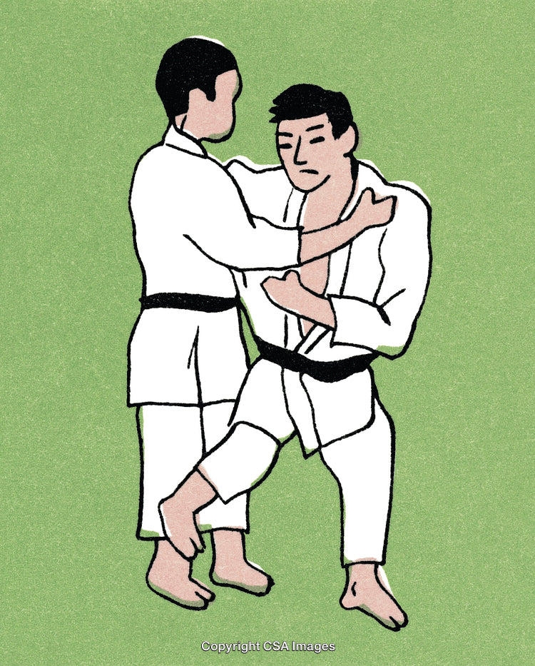 Two Men Practicing Karate