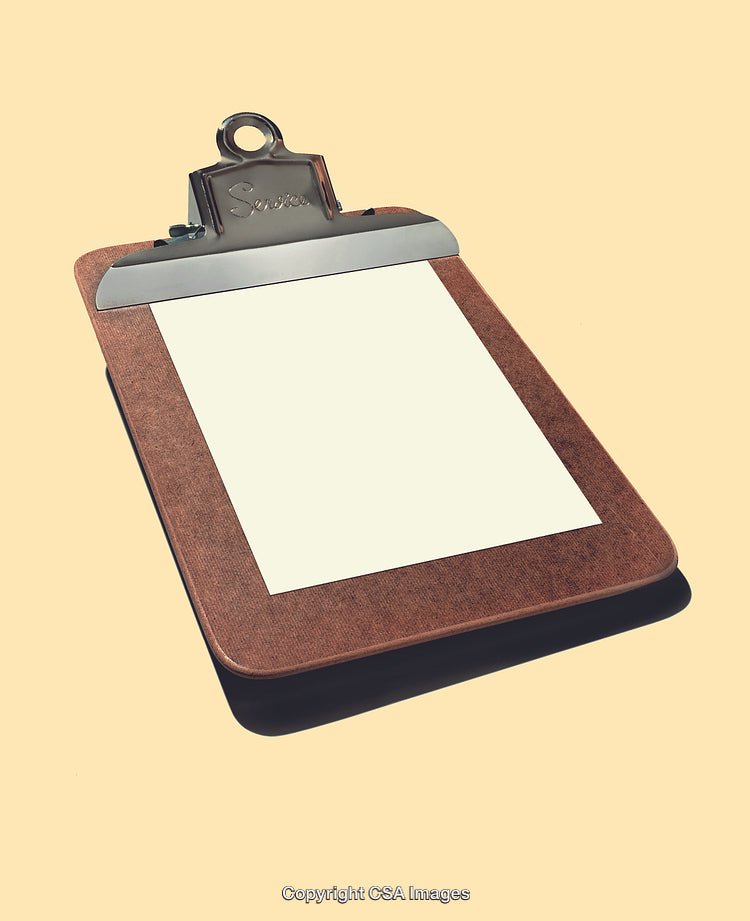Close-Up of a Vintage Clipboard With Paper on Neutral Background