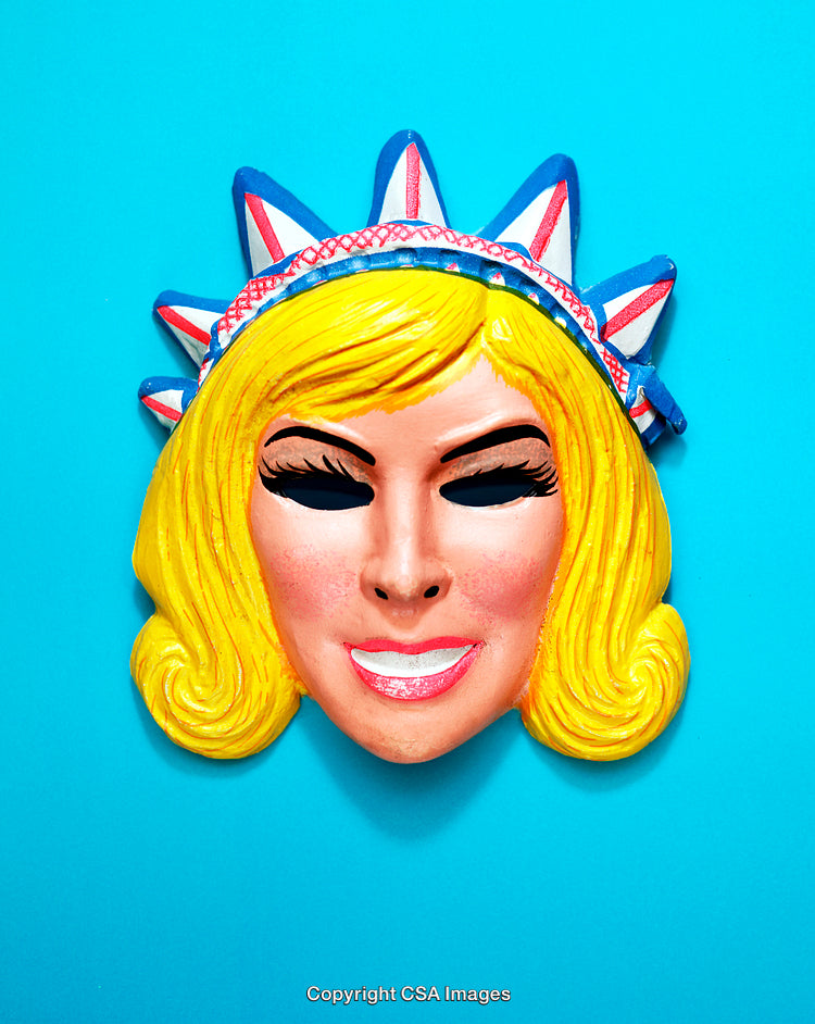 Colorful Plastic Mask with Retro Design on Bright Blue Background