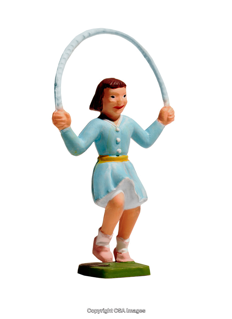 Vintage Figurine of Child Skipping Rope in Cheerful Play