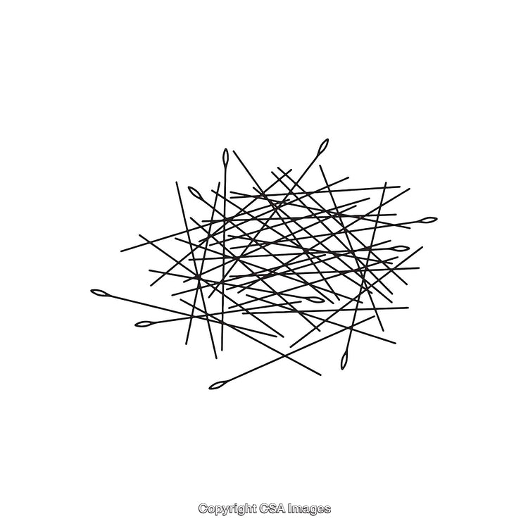 Abstract Pile of Sewing Needles on White Background