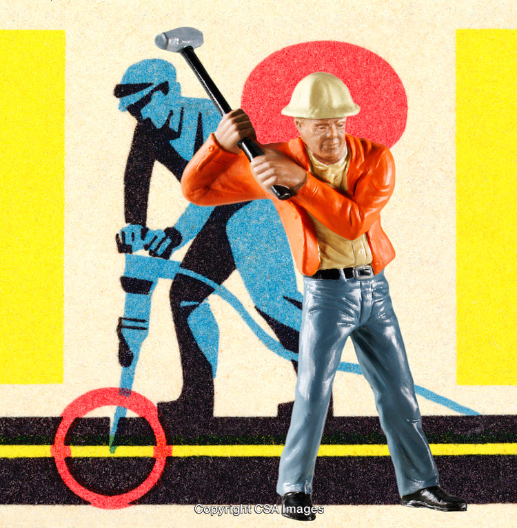 Plastic Toy Worker With Hammer in Bright Artistic Setting