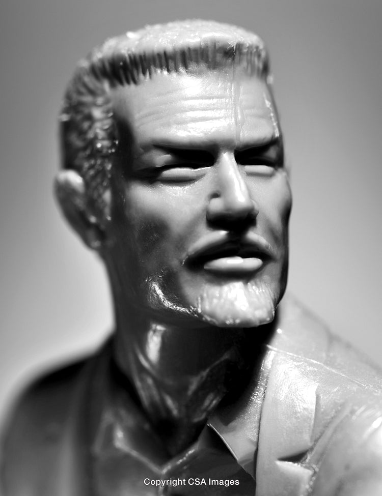 Close-Up of a Plastic Male Figure in Monochrome