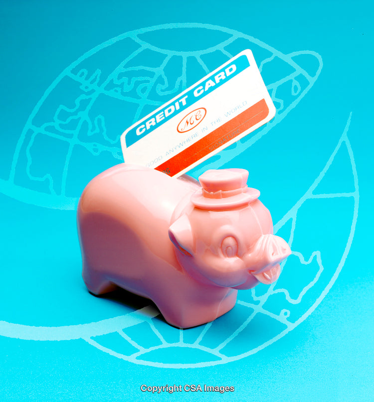 Colorful Piggy Bank with Credit Card on a Globally Inspired Blue Background