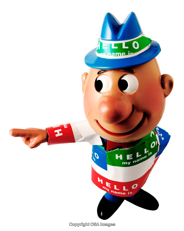 Colorful Toy Figure With Name Tags and Pointing Gesture