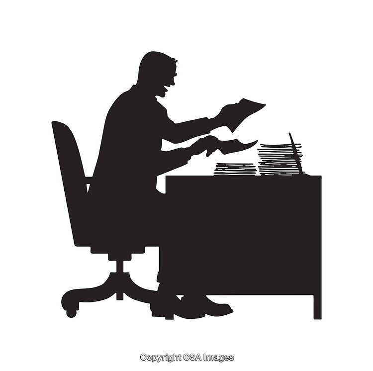 Black and White Silhouette of a Person Working at a Desk with Papers