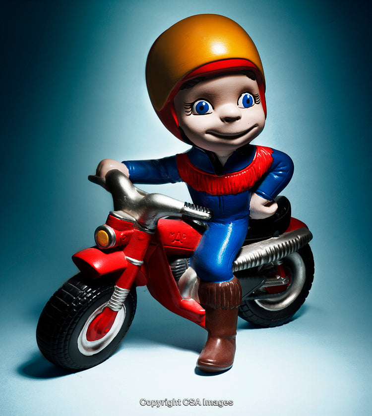 Colorful Plastic Toy Figure of Biker with Yellow Helmet on Motorcycle