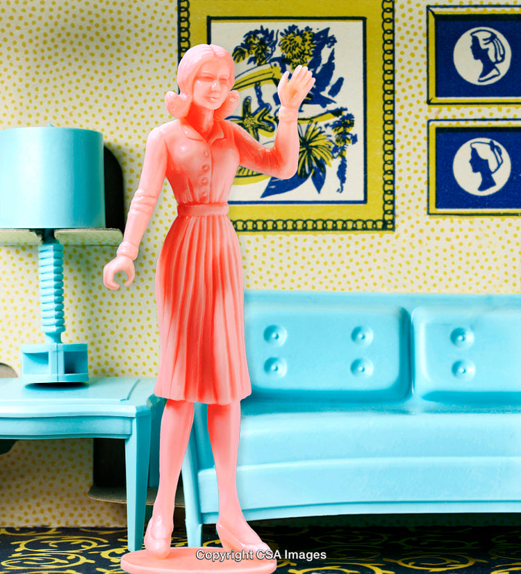 Vintage Plastic Figure in Dollhouse Style Setting with Retro Decor