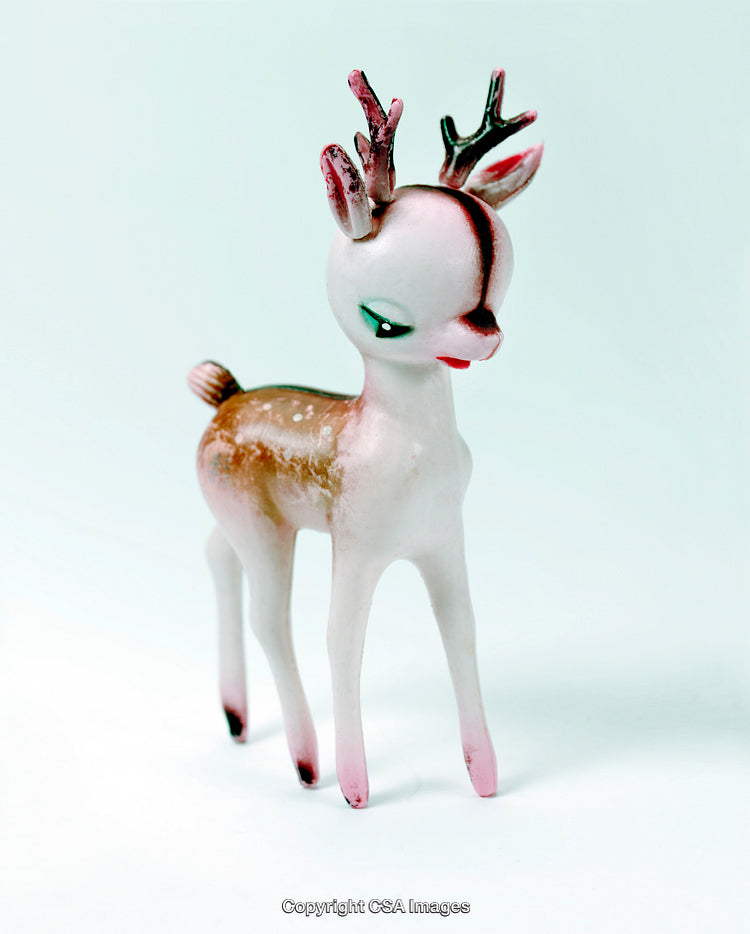 Vintage Plastic Reindeer Figurine with Antlers on Light Background