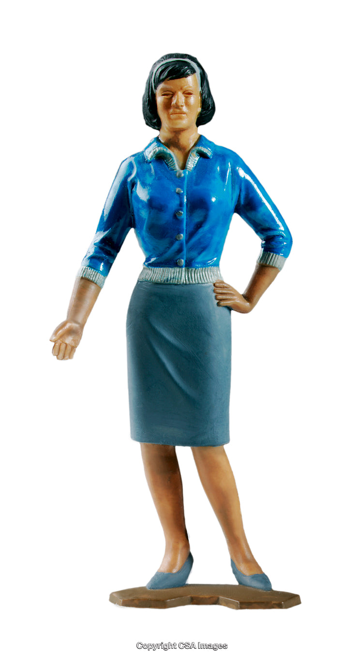 Female Figurine in Professional Attire Displayed on White Background