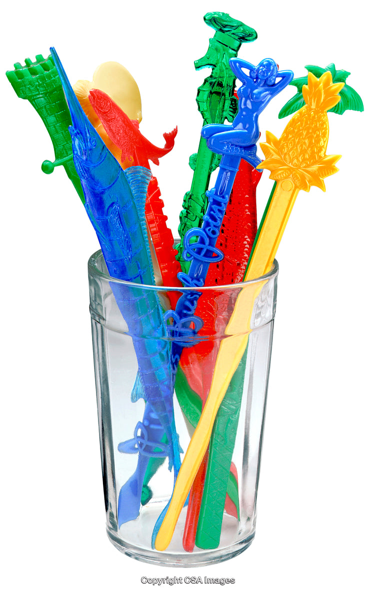 Colorful Plastic Cocktail Stirrers Arranged in a Glass
