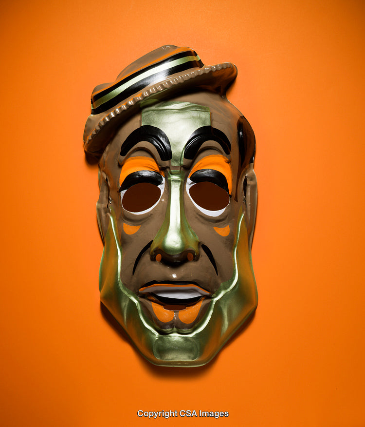 Vibrant Mask on Orange Background with Unique Design