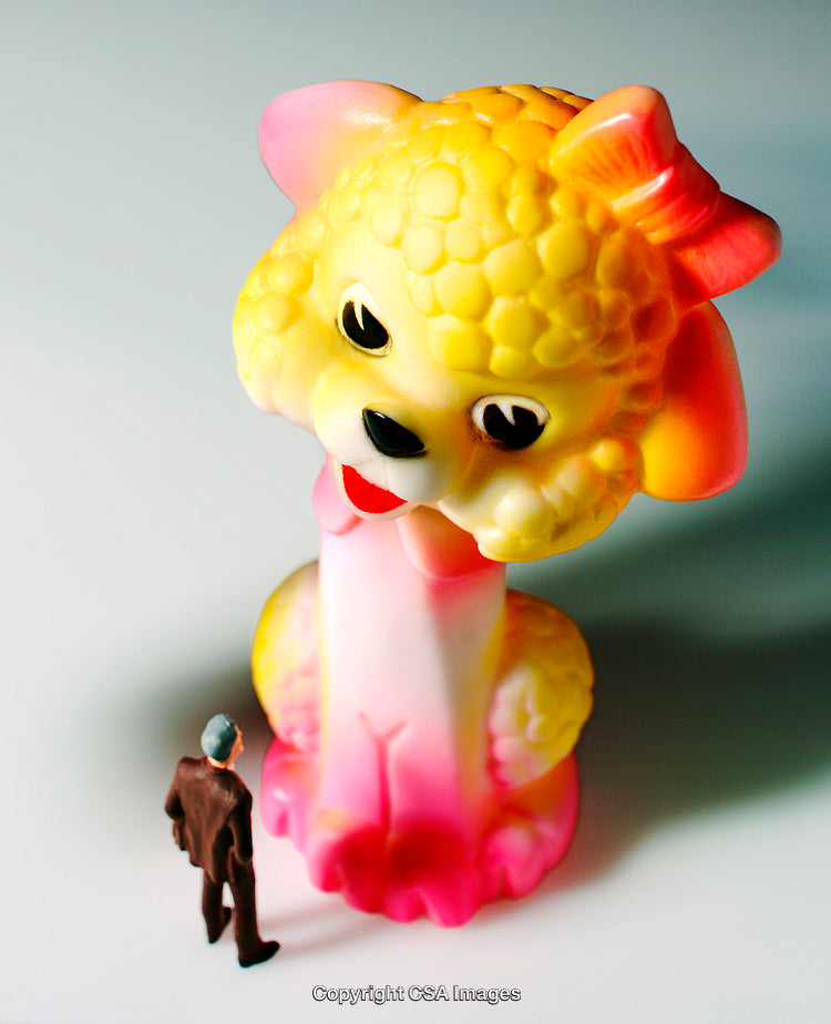 Toy Figurines Display With Large Colorful Plastic Animal