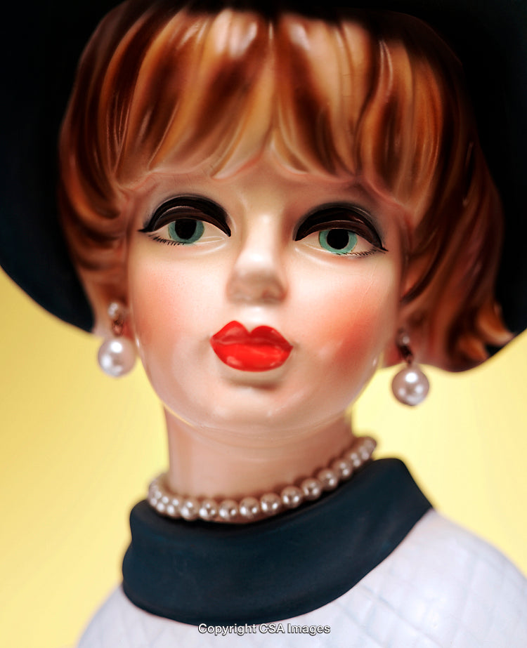 Portrait of a Vintage Plastic Figurine with a Chic Retro Aesthetic