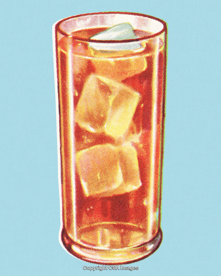 Refreshing Beverage in a Glass with Ice Cubes on Blue Background