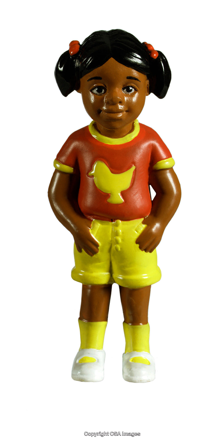 Colorful Toy Figure of a Girl Wearing a Red Shirt and Yellow Shorts