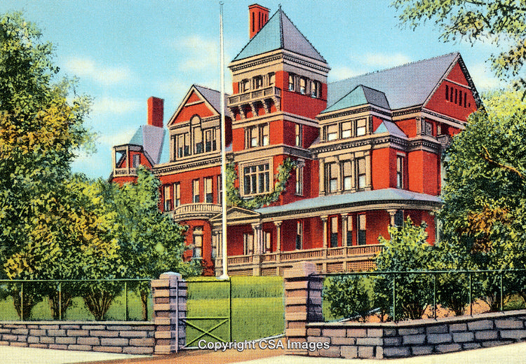 Elegant Red Brick Mansion Surrounded by Scenic Greenery in a Serene Environment